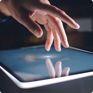 Finger touching interactive touchscreen kiosk used in trade show AV rental setup