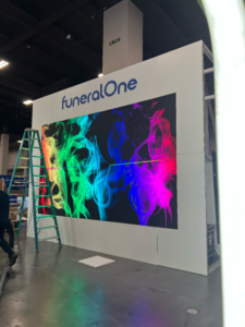 Large LED video wall setup at trade show booth by AVR Expos for brand presentation